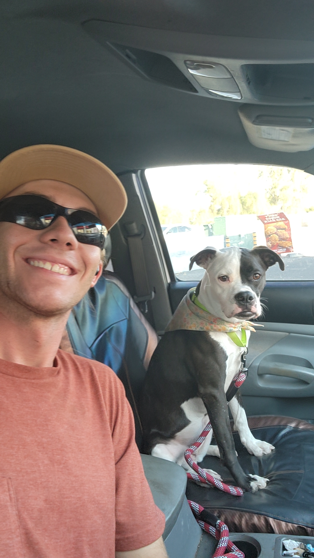 Me with my pup at the truck window